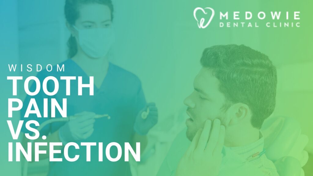 Examining wisdom tooth X-ray at Medowie Dental near Raymond Terrace.